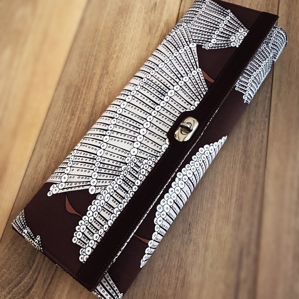 Agnes & Hoss Silk coral clutch